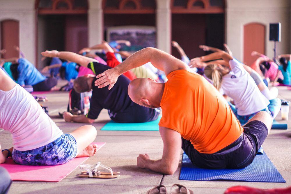 Office team stretching during a wellness break, article thumbnail